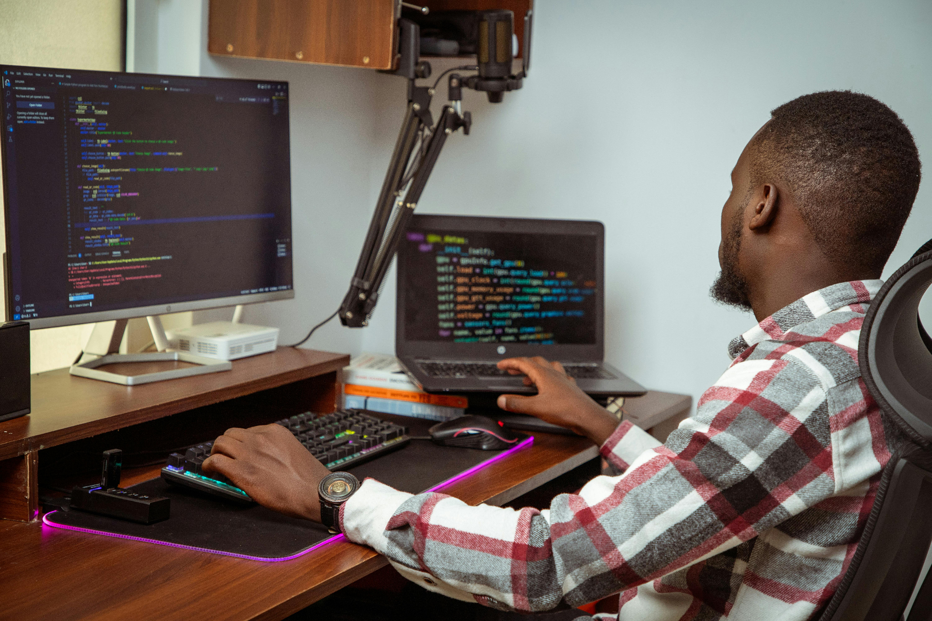 Developer working on code at Mobixgen office
