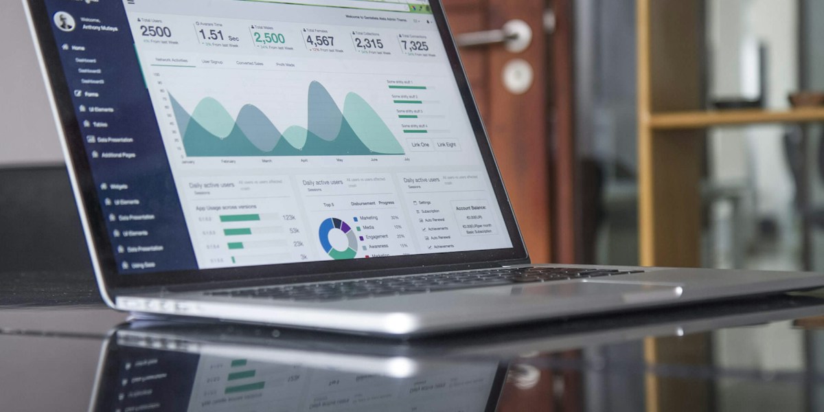 Business analytics and digital strategy on a laptop
